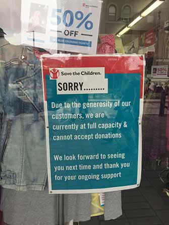 sign_in_charity_shop_window